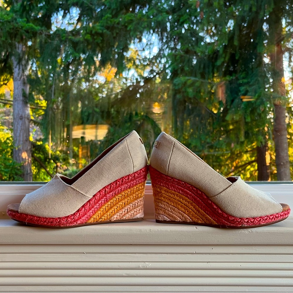 Off white canvas wedge with rainbow heel. Only worn twice.